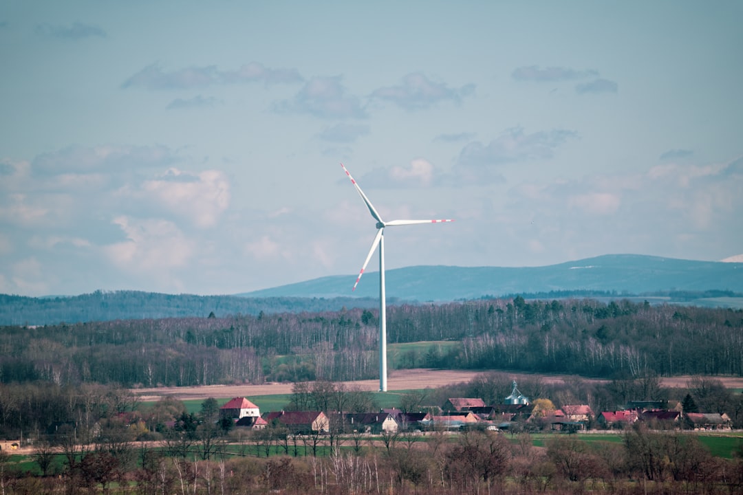 services-01 white-wind-turbine-on-green-grass-field-during-daytime-mmtjj8jp-rw